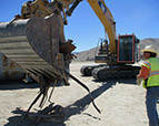 QA Services Gallery Image - Inspecting a load of metal prior to recycling.